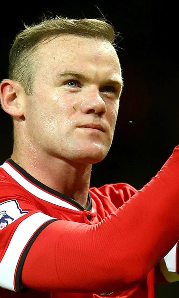 Wayne Rooney signs head of young fan battling cancer